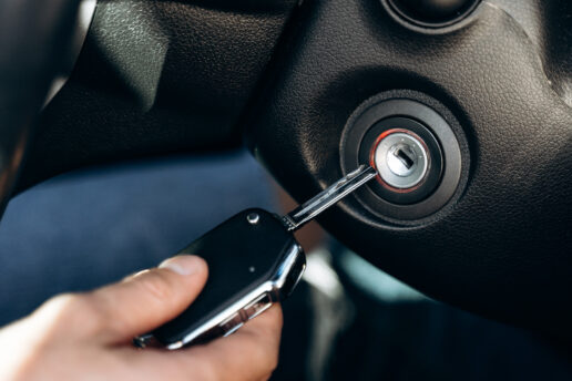 Hand inserting car key into ignition - Central locking repair Nottingham
